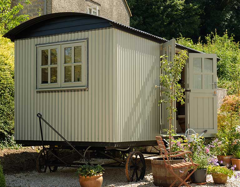 Plankbridge shepherd's hut. Garden buildings with two doors